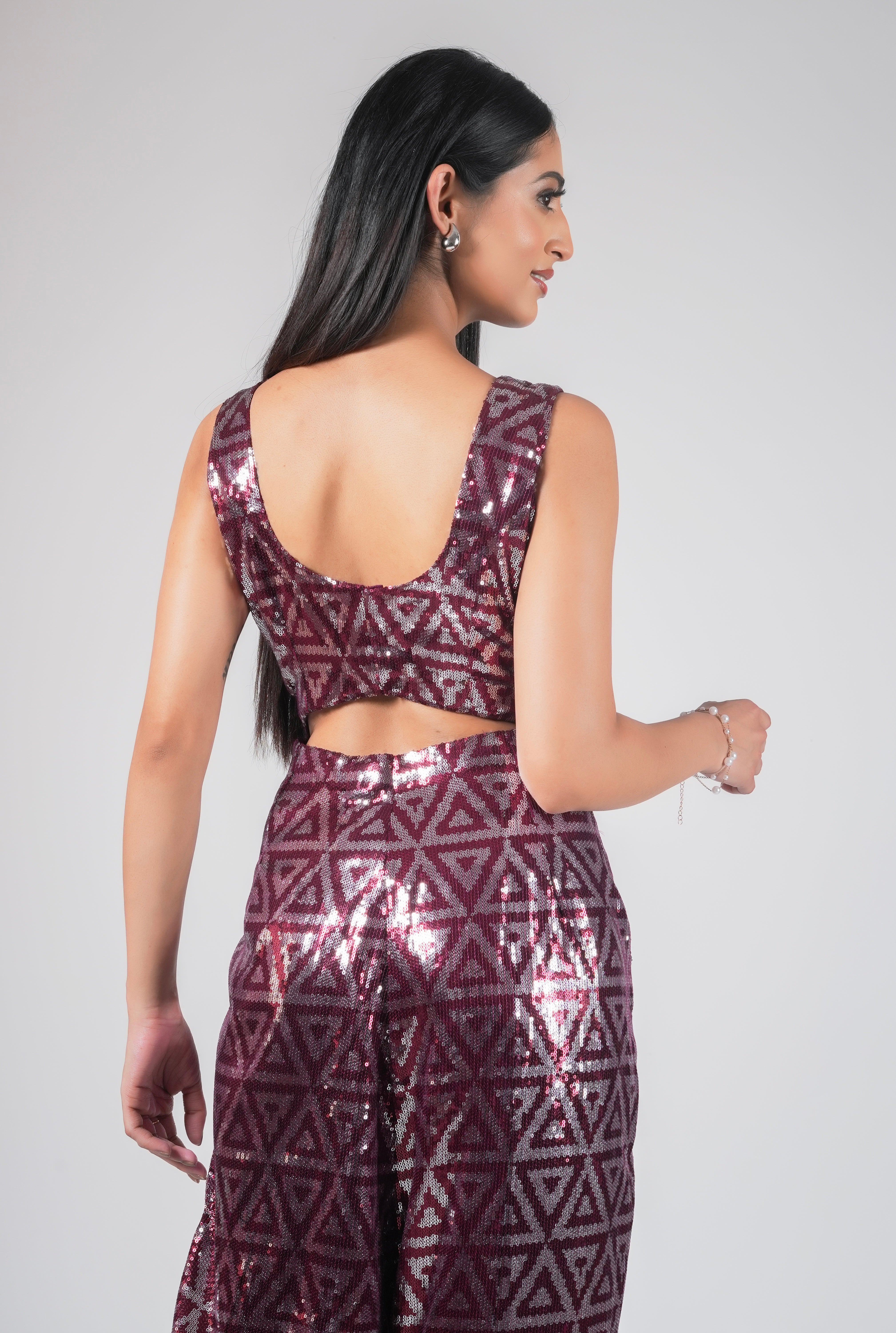 RED SEQUIN JUMPSUIT WITH CUT OUTS