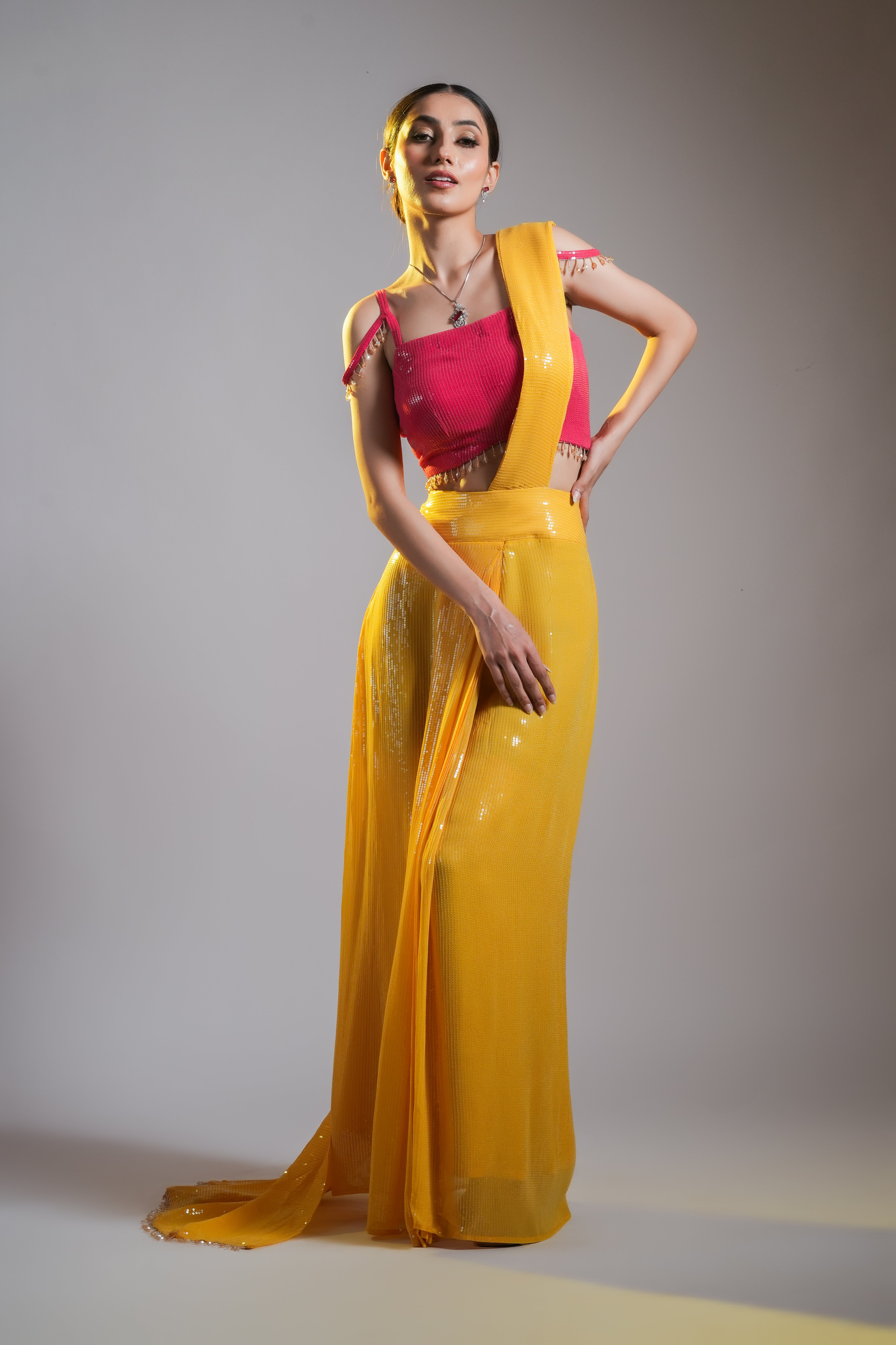PRE DRAPED SEQUIN SAREE WITH TASSEL BLOUSE